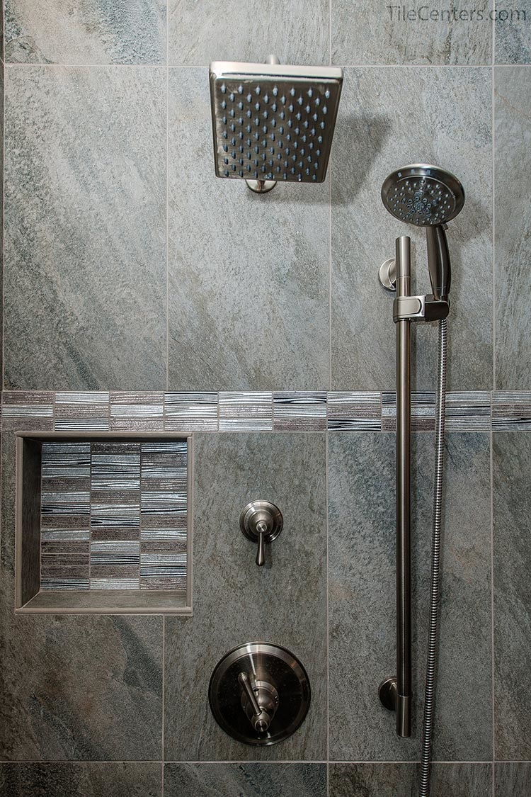 Grey Tile Shower with Brushed Nickel Faucet and Niche
