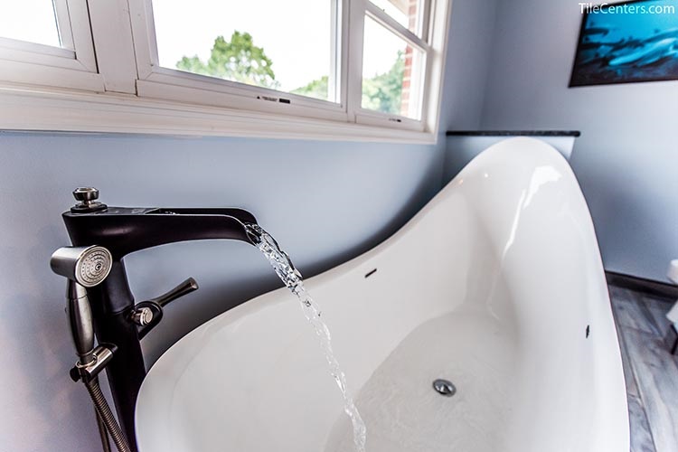 Freestanding Tub with Black Faucet