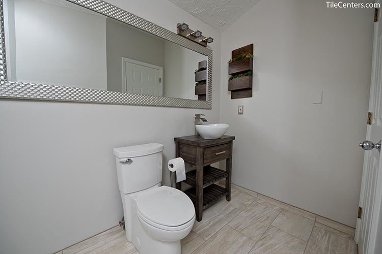 Toilet and Sink with Dark Brown Bathroom Cabinet