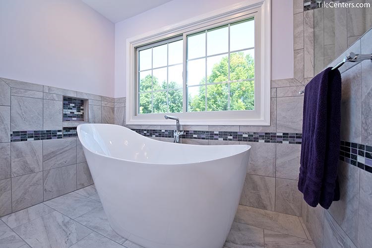 Freestanding Bathtub with Grey Surround Tile and Purple Accent Tile